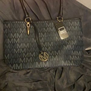 Medium Handbag by Mia K